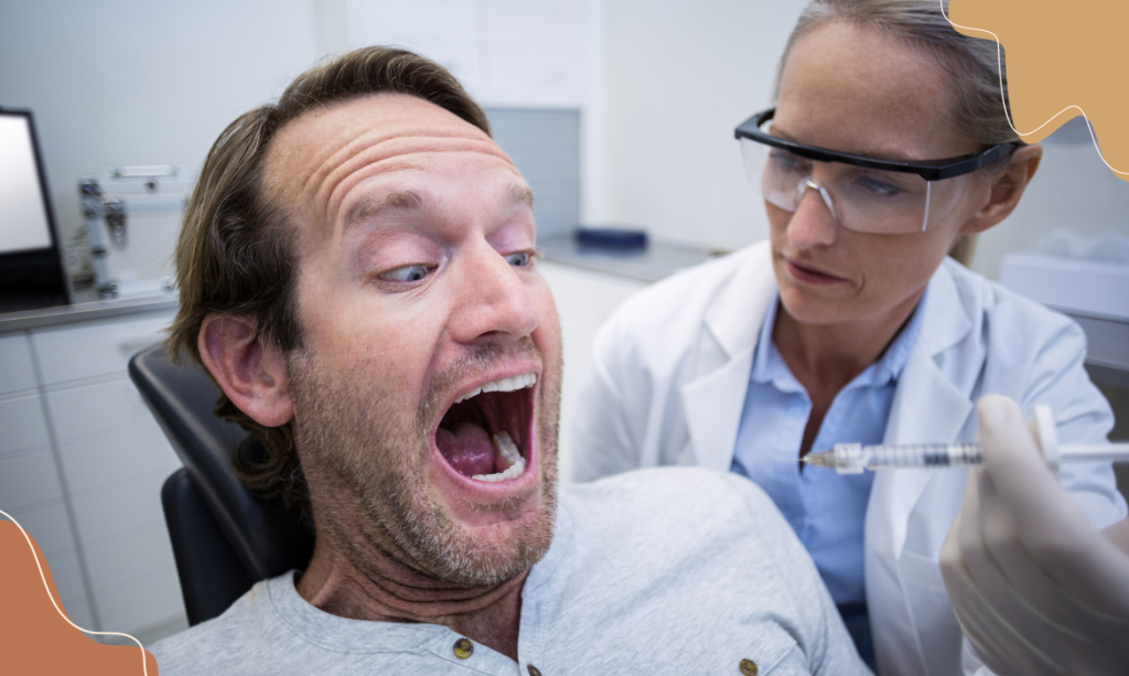 homem assustado com agulha no dentista - sedação consciente